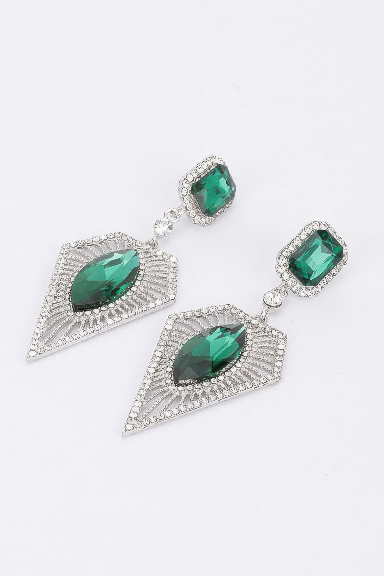 Green rhinestone drop earrings with rectangular stud tops and large teardrop crystals