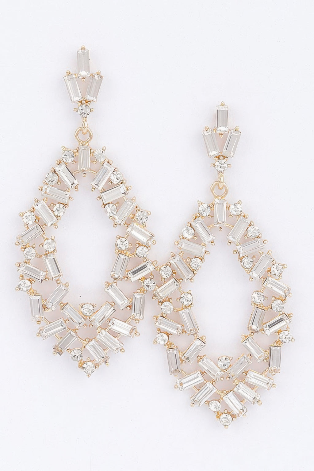 Gold rhinestone hoop earrings with baguette stones and dangling charm