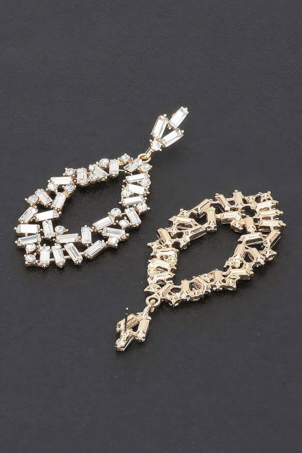 Gold rhinestone drop earrings showing ring shape with baguette sparkle stones