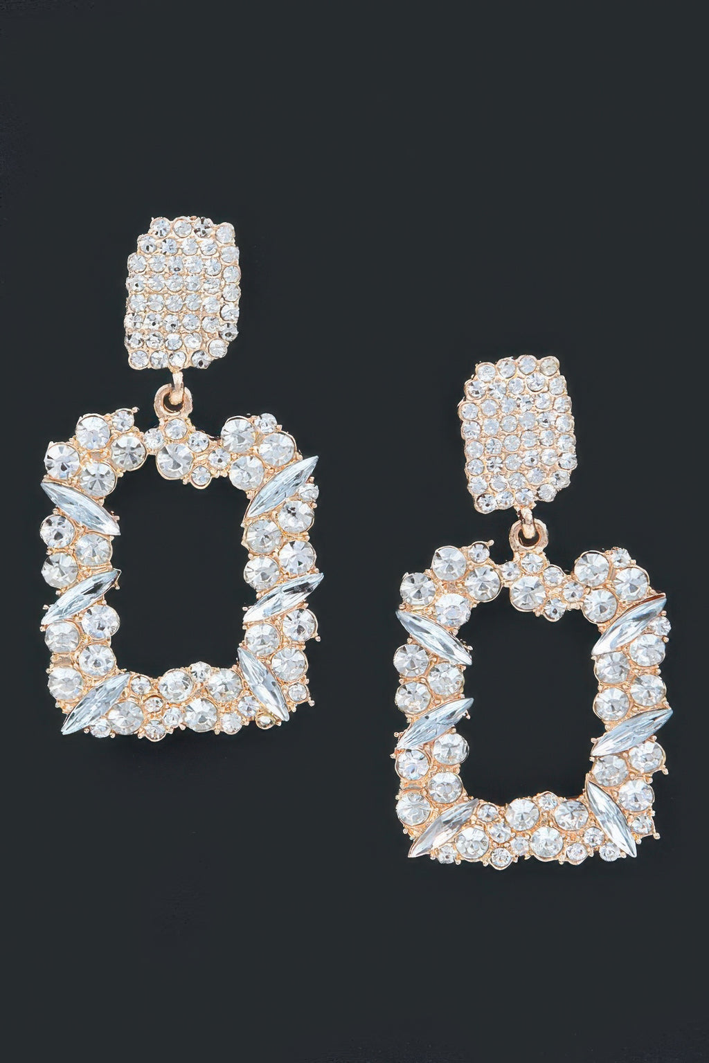 Gold rhinestone hoop earrings with square stud tops and curved teardrop stones