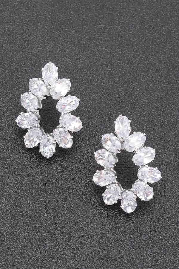 Silver-tone rhinestone hoop earrings with oval clear stones in a scalloped cluster.