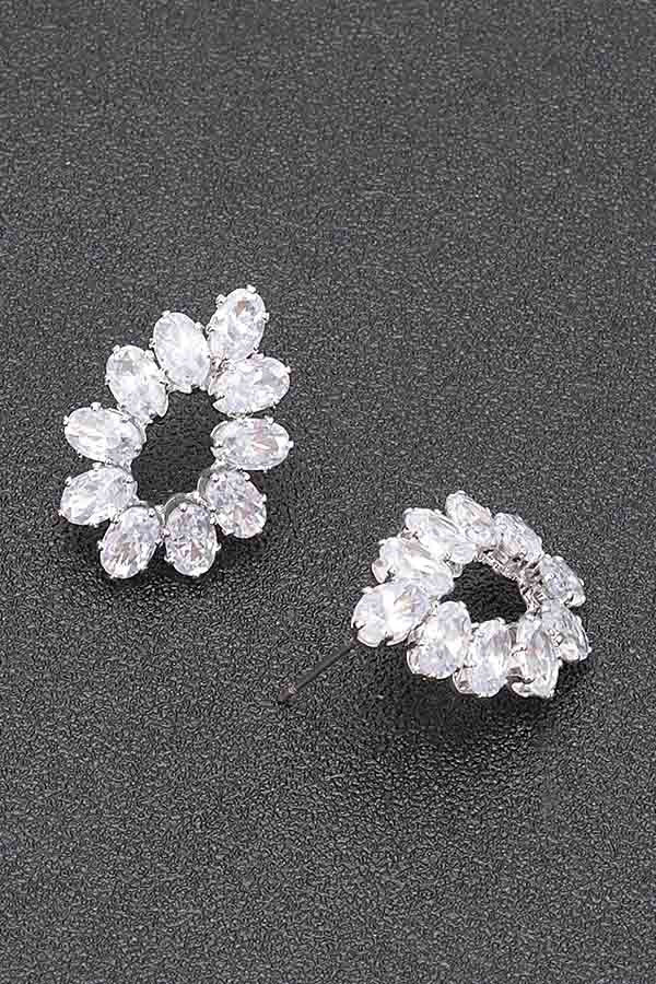 Silver-tone rhinestone hoop earrings with oval clear stones, full circular cluster.
