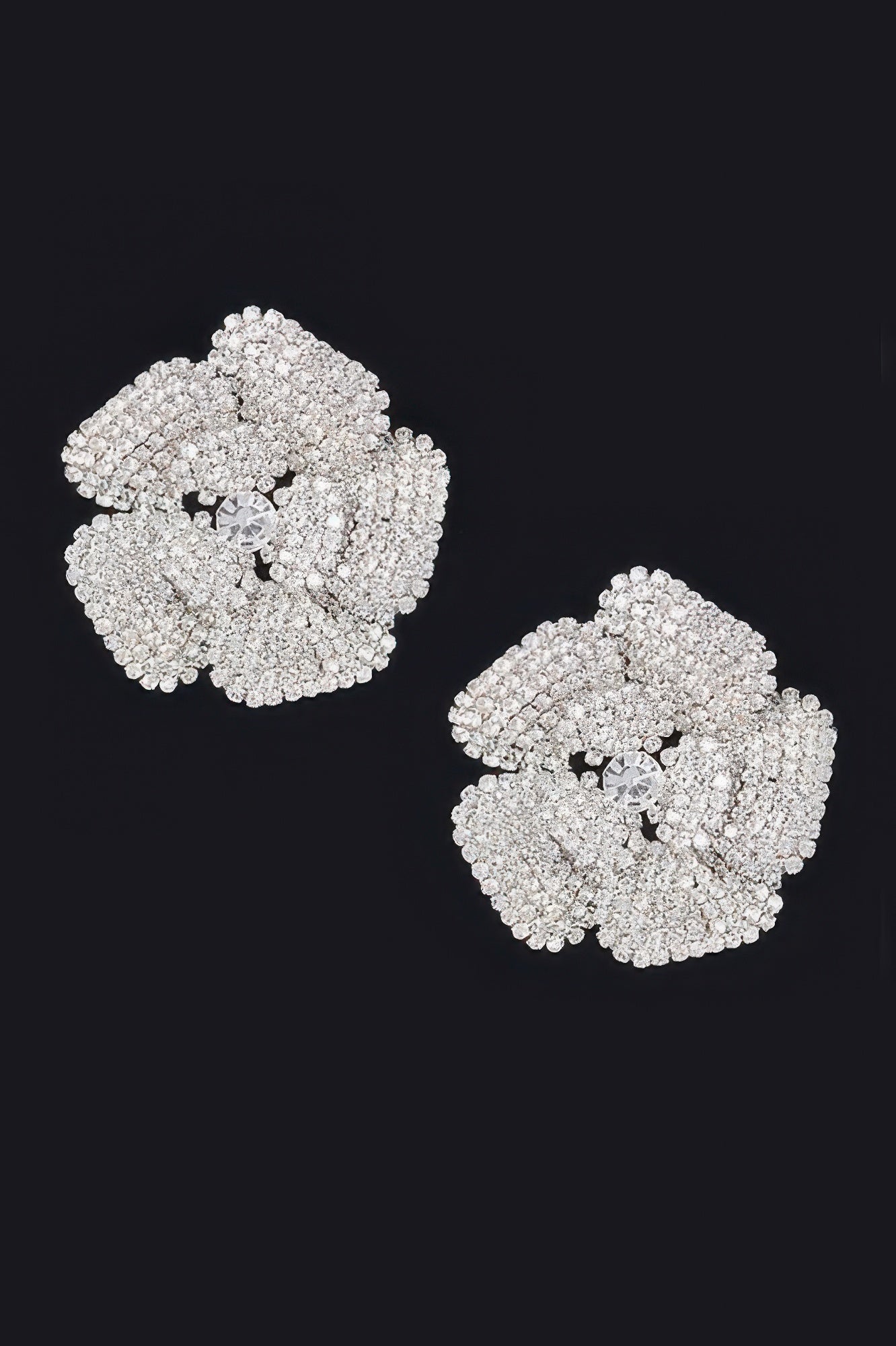 Rhinestone flower stud earrings, silver-tone with light center stone