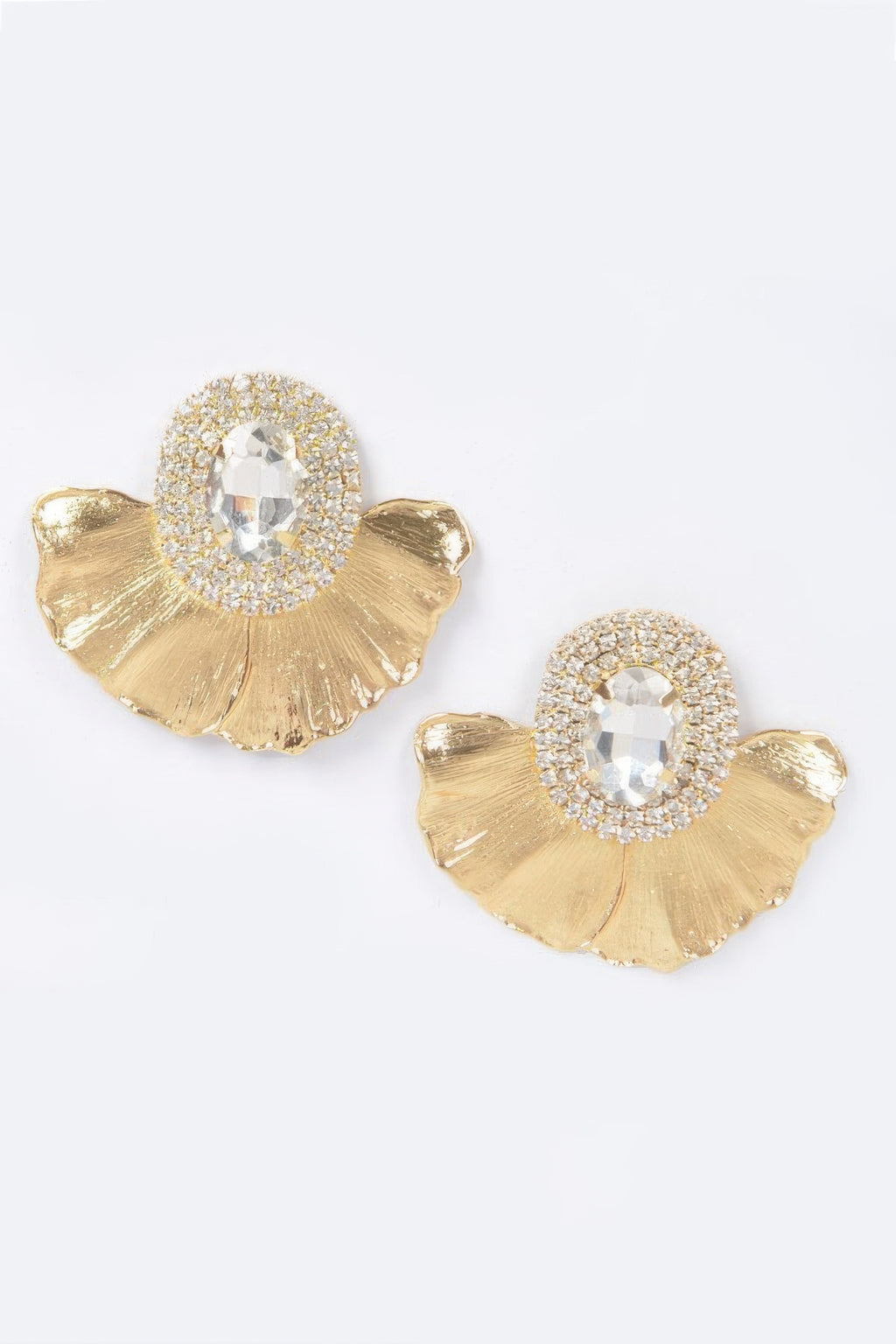 Clear rhinestone metal earrings with oval faceted stone and gold-tone fan backing