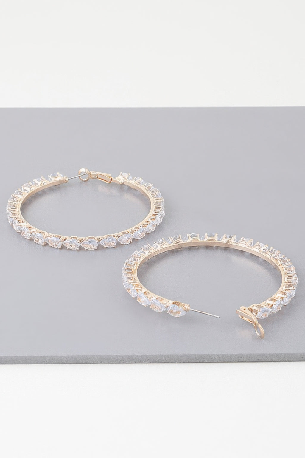 Teardrop jeweled hoop earrings, gold-tone with teardrop-shaped crystal settings