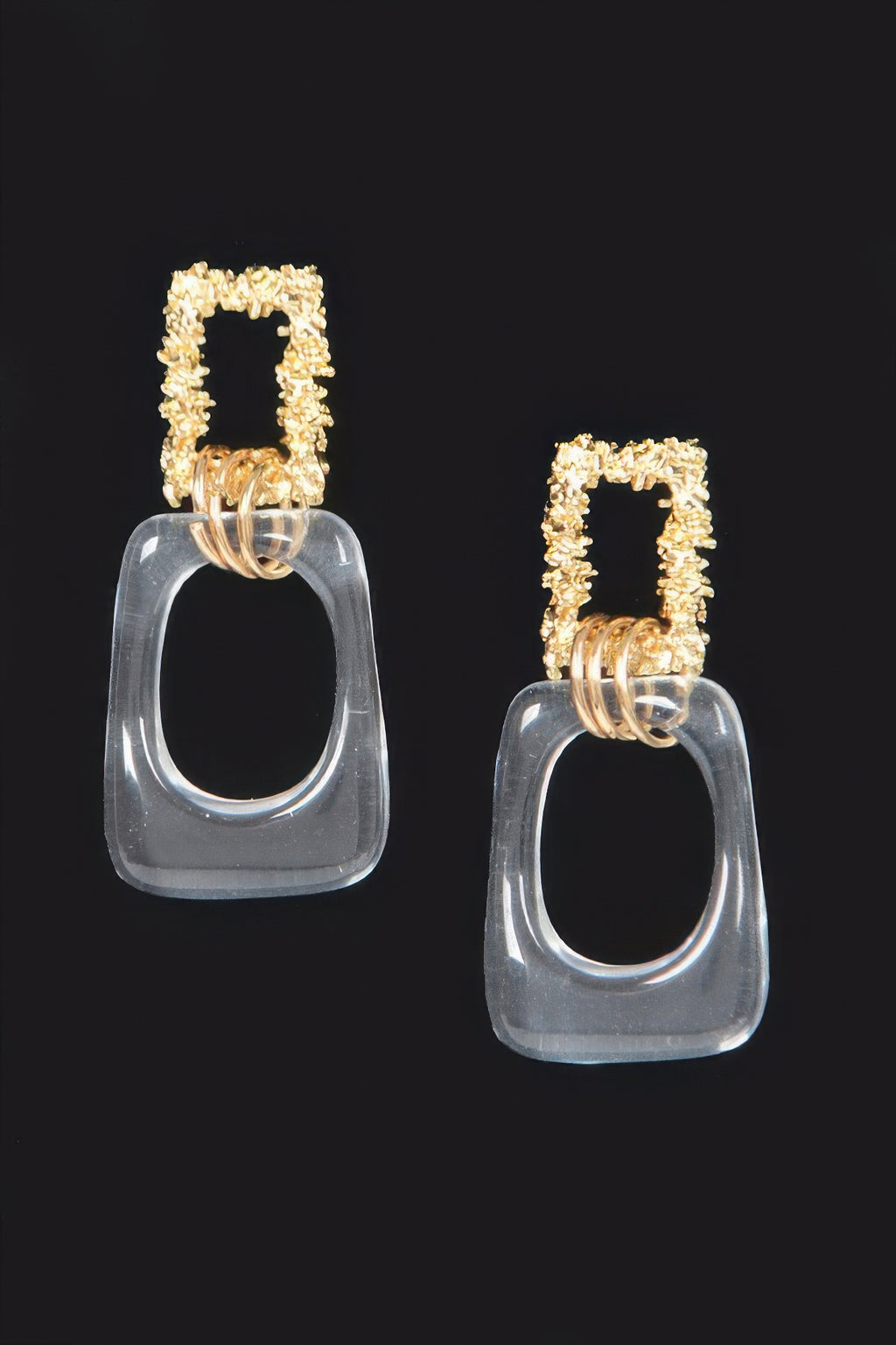 Vintage clear dangle earrings with gold textured square tops and oval lucite drops