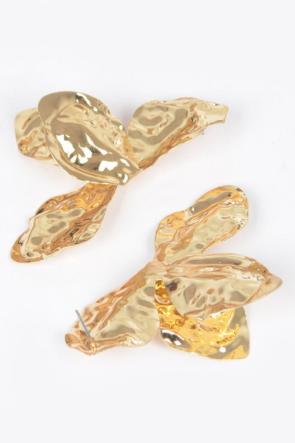 Vintage metal earrings, gold-tone sculpted leaf-like shapes with stud backs