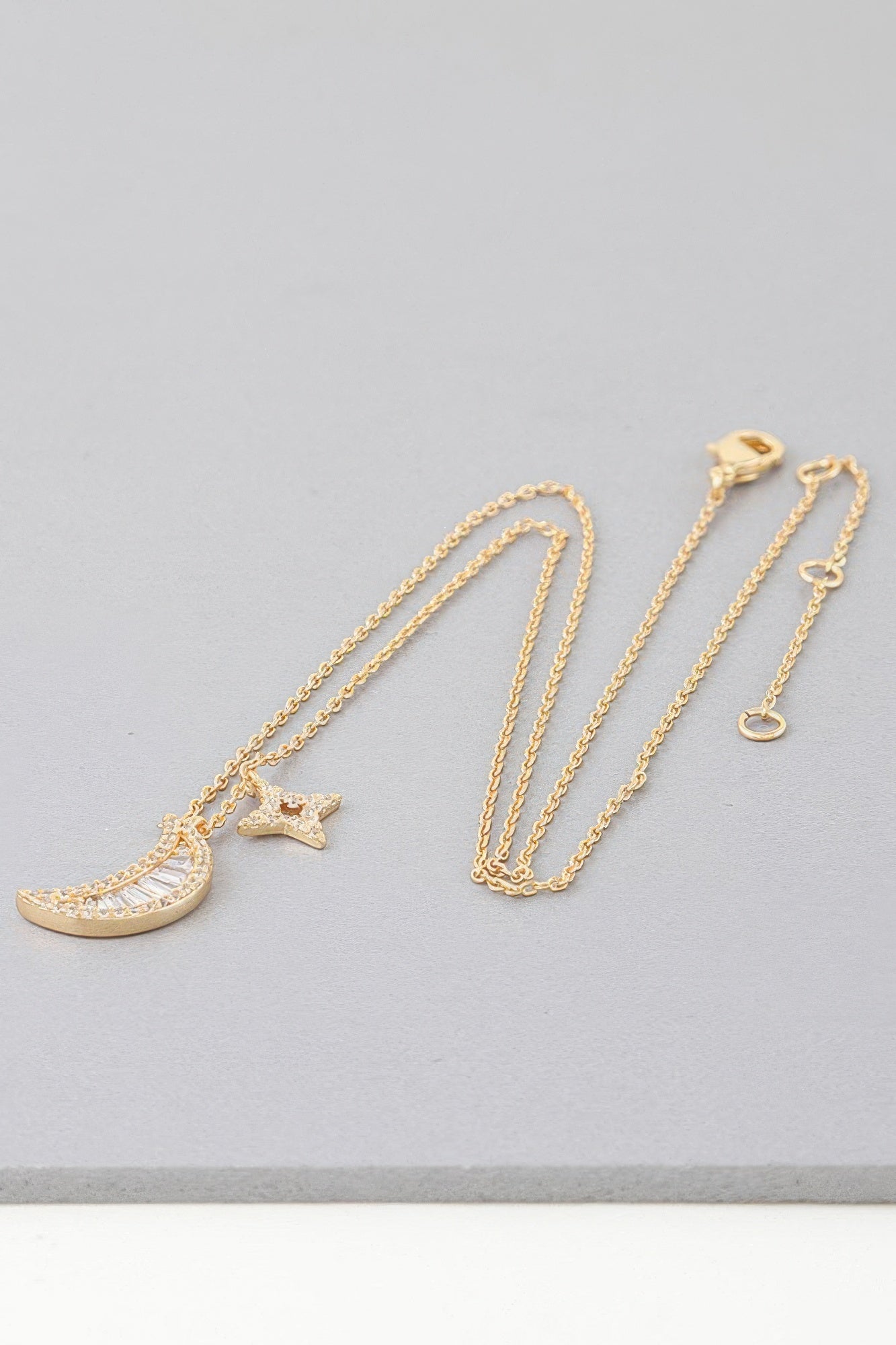 Jeweled Sun N Moon necklace, gold tone chain with crescent moon and star charms