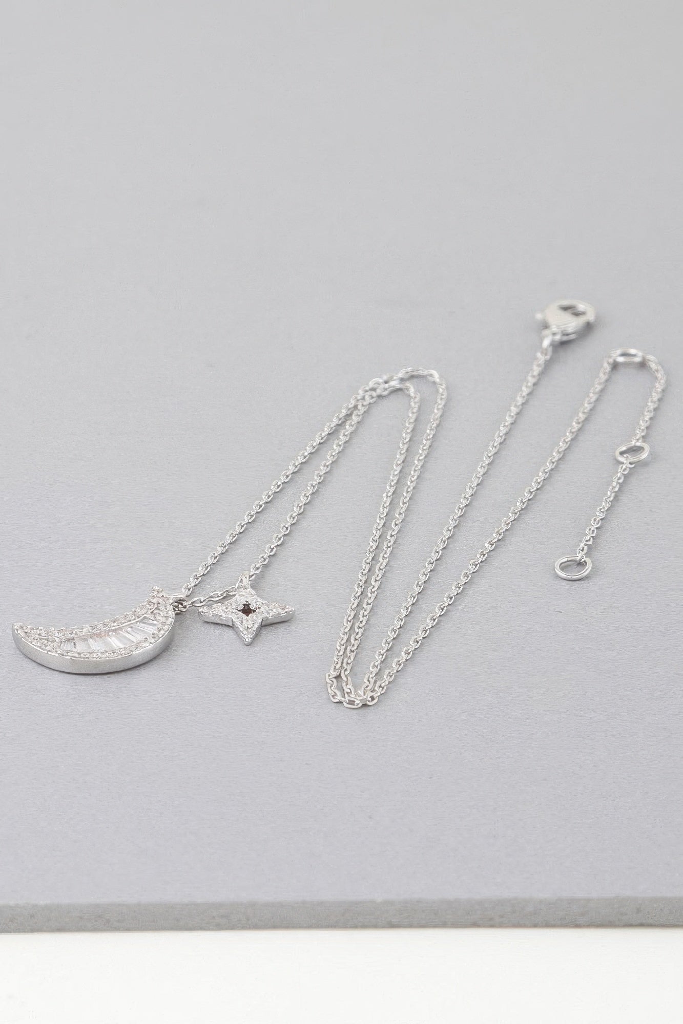 Jeweled Sun N Moon necklace, silver tone chain with crescent moon and star charms