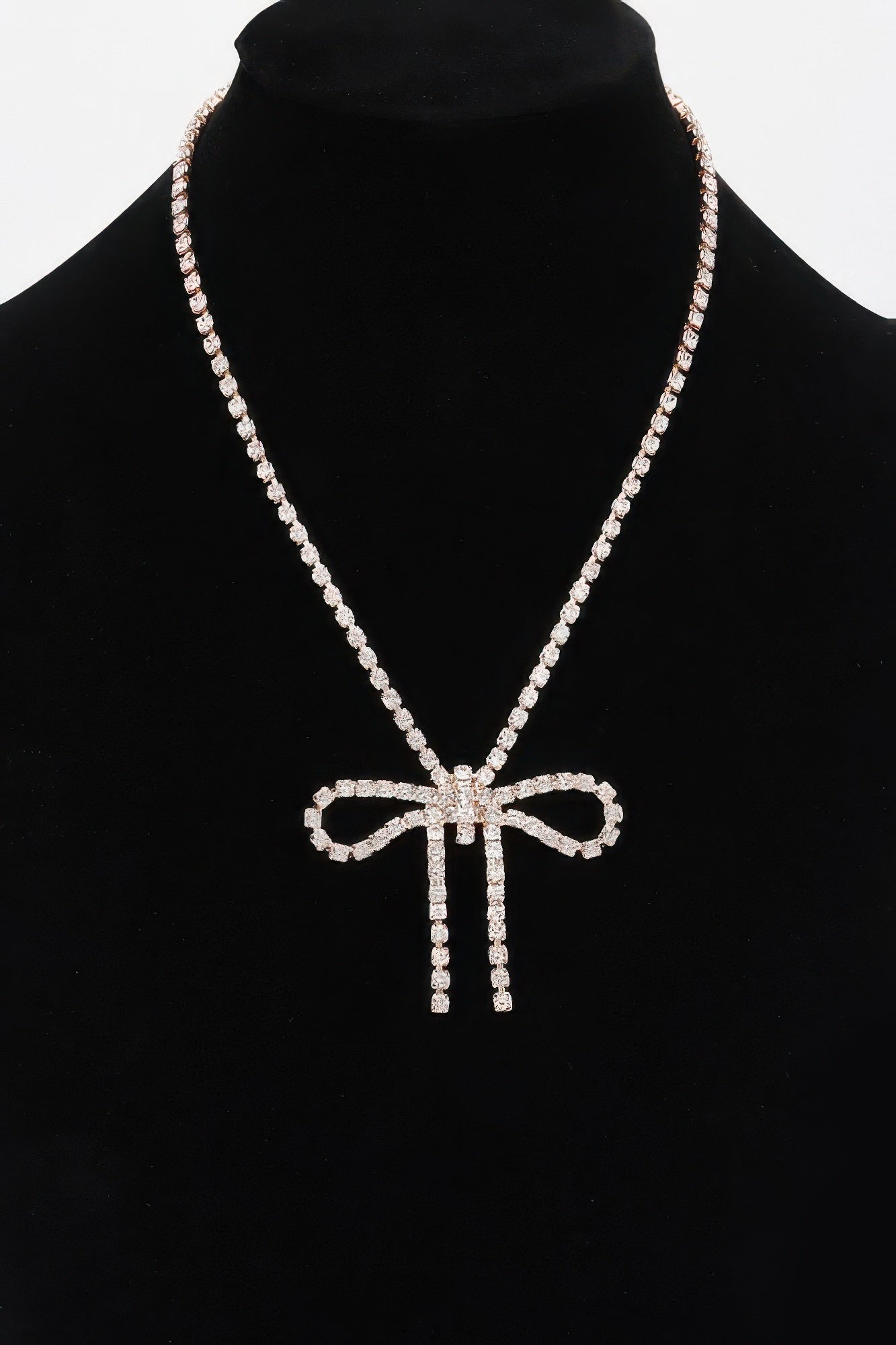 Rhinestone bow necklace, gold-clear stones with bow pendant and rhinestone chain