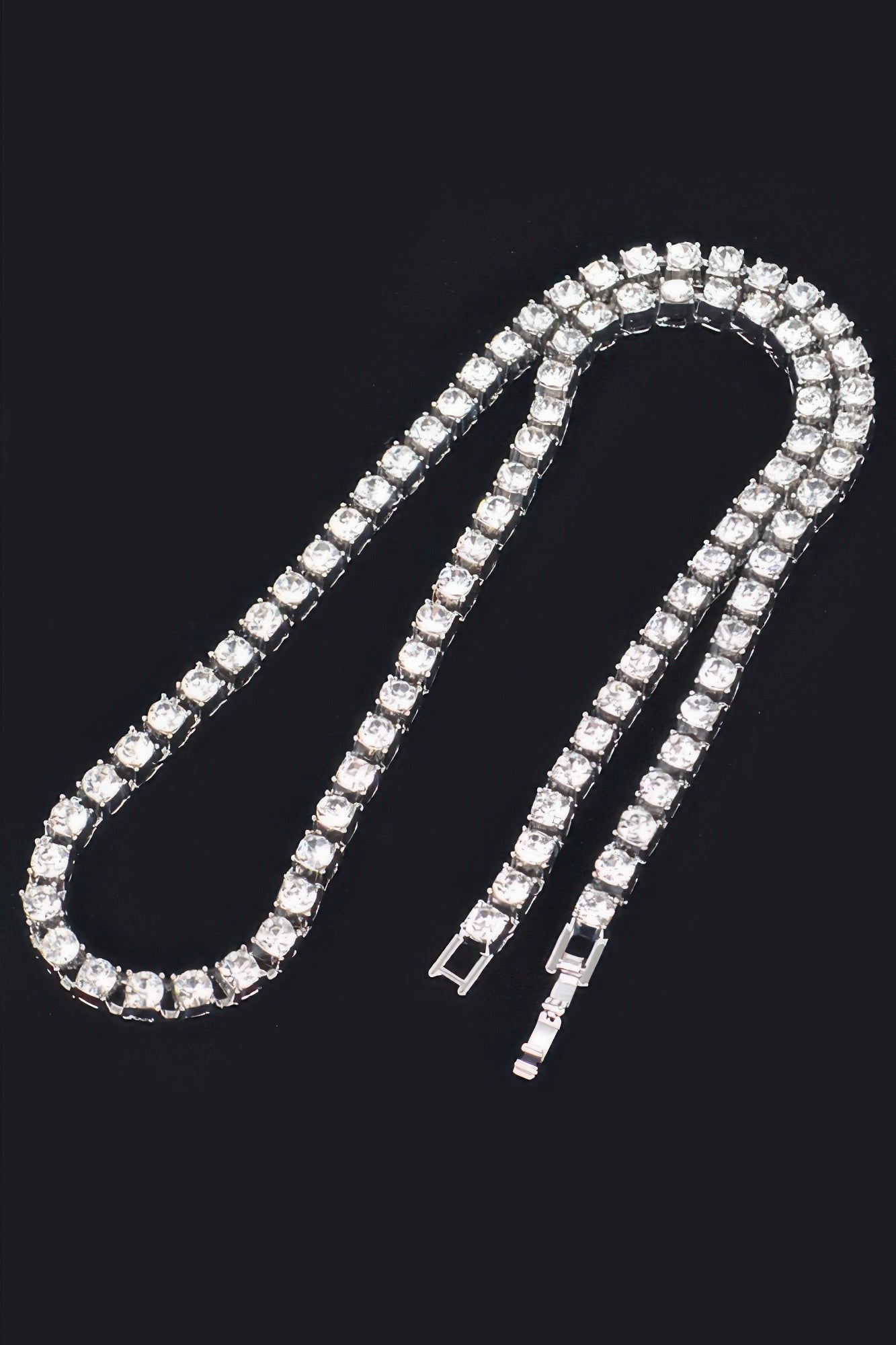 Silver-tone rhinestone layered necklace with U-shaped design and clasp