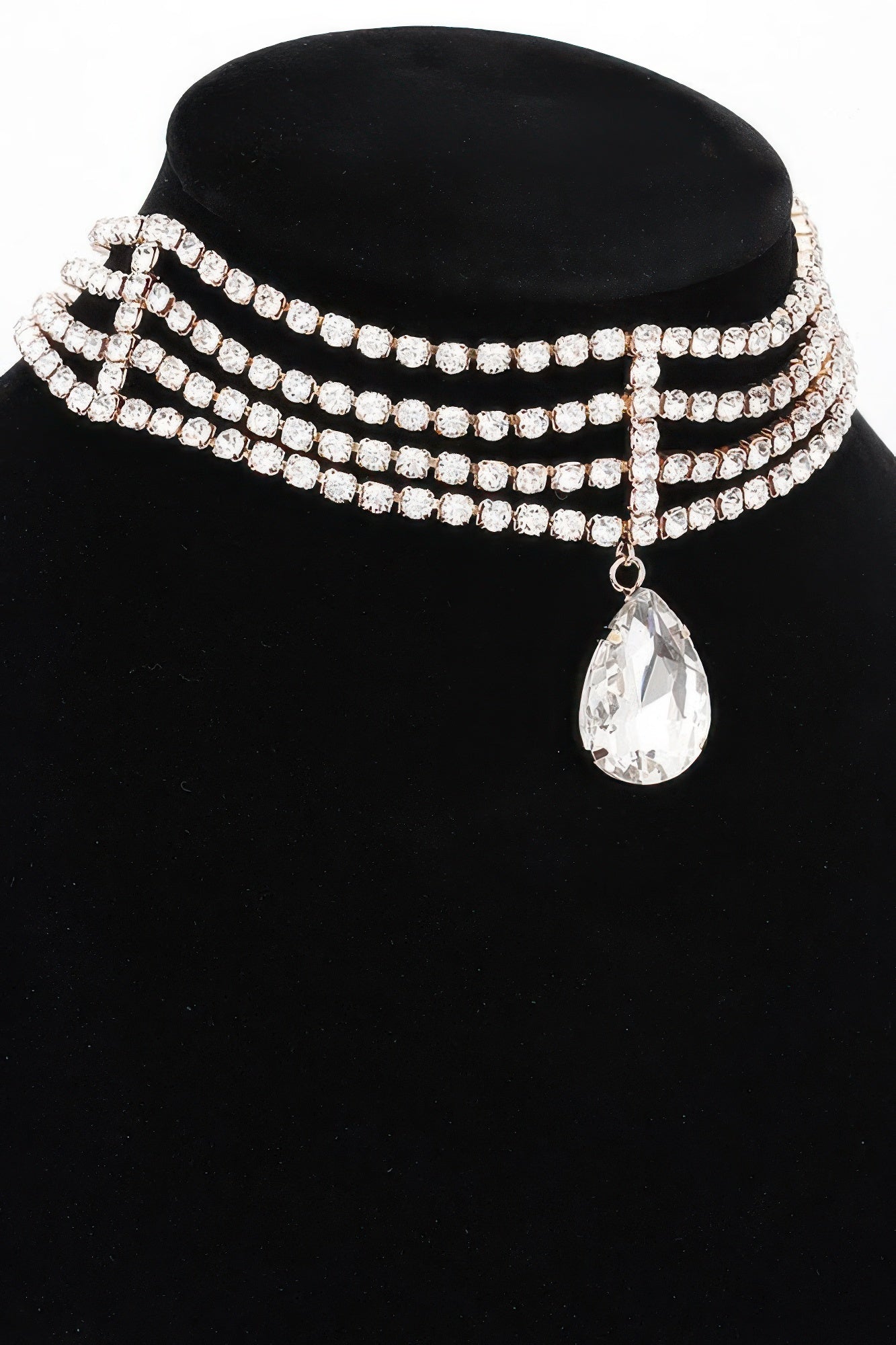 Layered rhinestone choker necklace with clear stones and teardrop drop charm