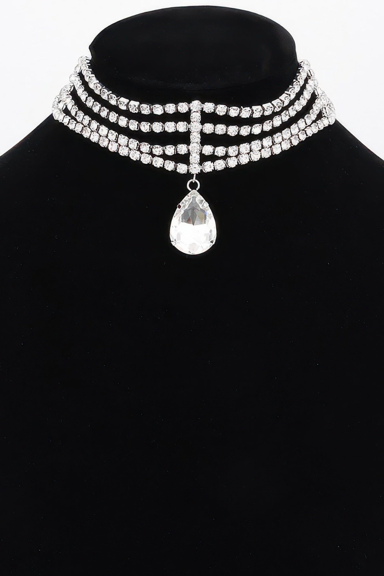 Rhinestone choker necklace with layered rows of clear stones and central teardrop crystal