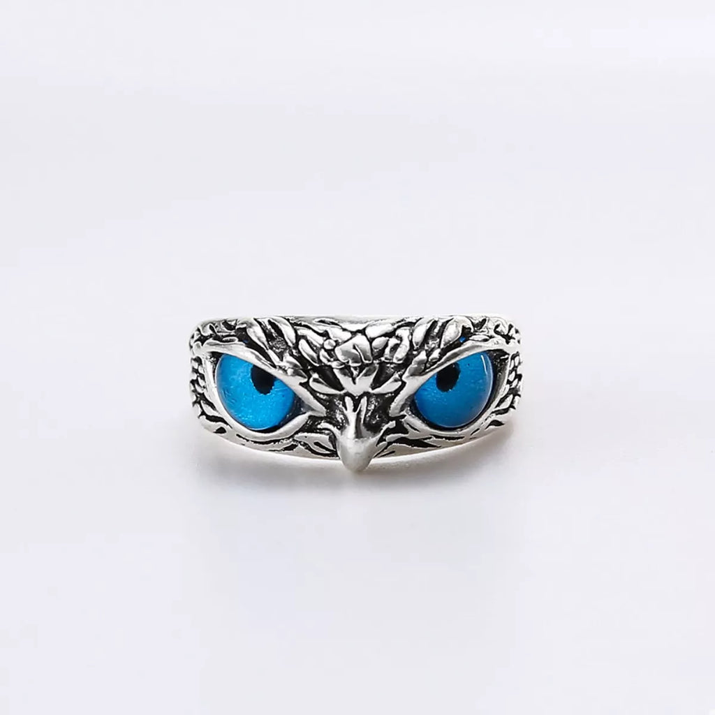 Silver owl eyes ring, centered front design with two bright blue eye cabochons