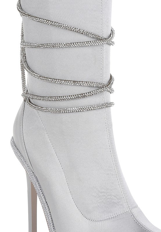 Light silver calf boots with rhinestone strap accents and 4-inch heel