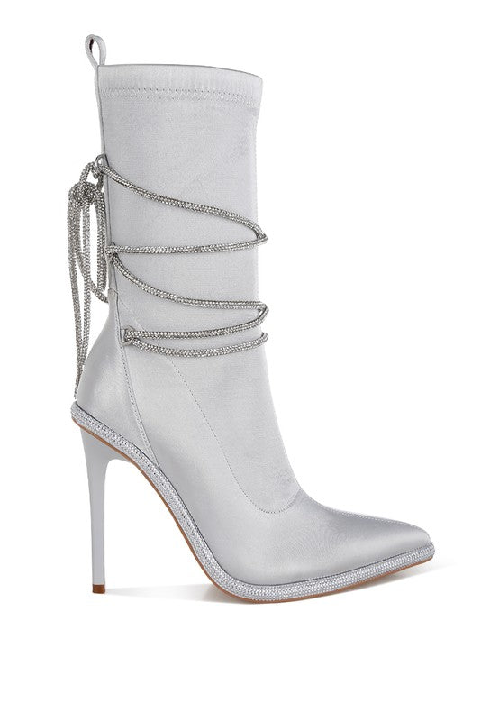 Light silver calf boots with rhinestone strap bands and 4-inch heels
