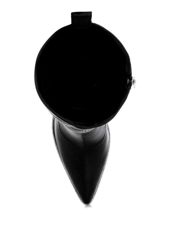 Black calf boot inner side view with rhinestone trim along the pointed toe