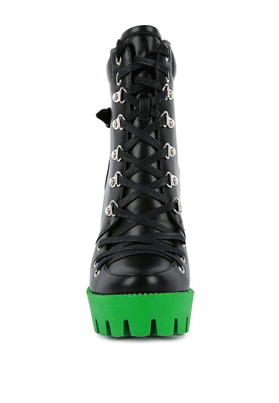 Black lace-up biker boot with green platform sole and padded collar