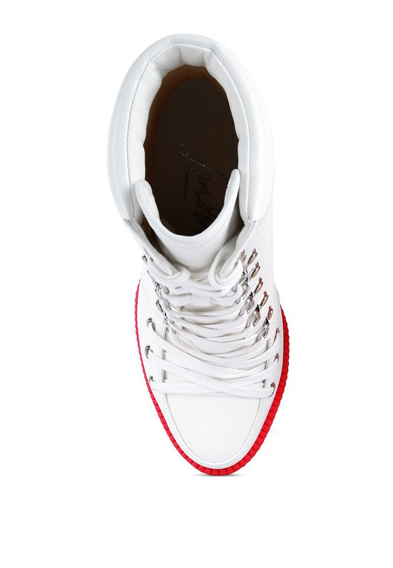White biker boot with padded collar, lace-up front and inner lining visible
