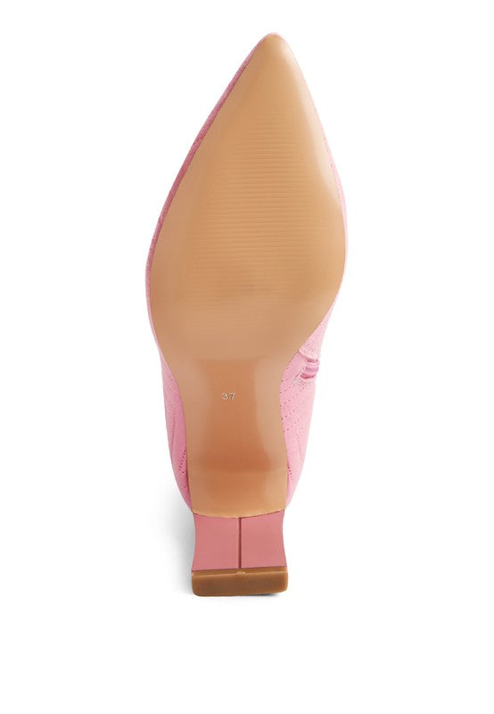 Pink pointed toe stiletto-style heel view with boot upper and sole
