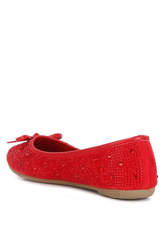 Red ballet flats with rhinestone and stud embellishment, bow at back