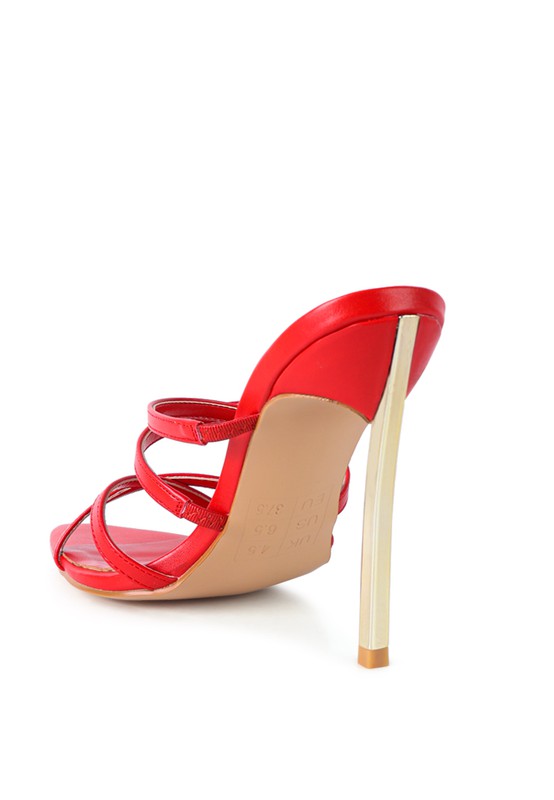 Red heeled sandals viewed from the back, open toe and ankle strap