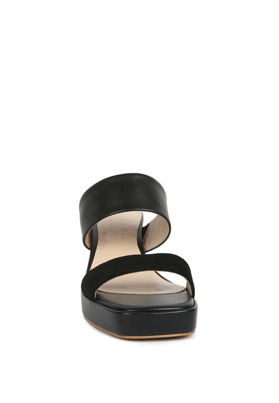 Black suede platform slide sandals with open toe and wide toe strap