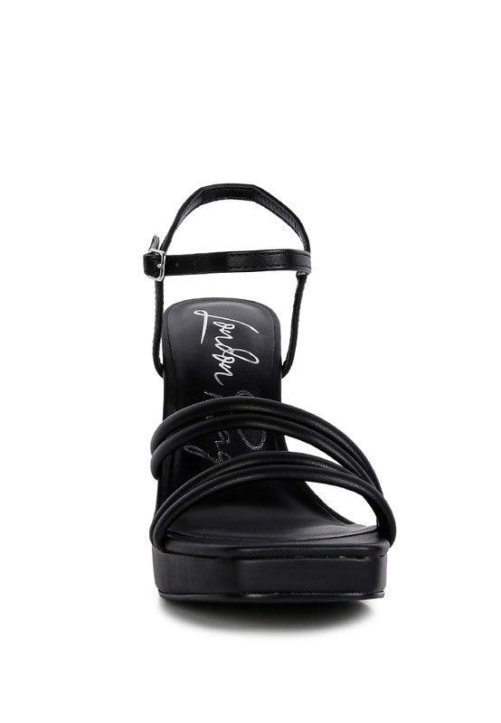 Black platform high-heel sandals front view with ankle strap buckle