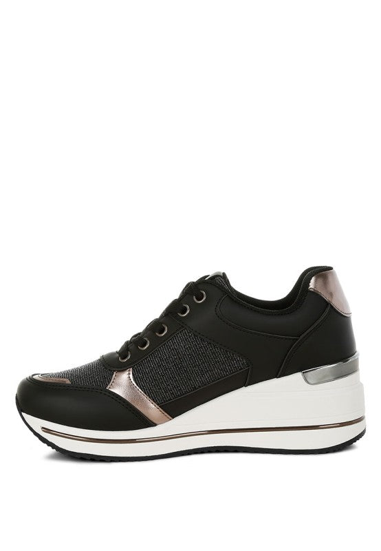 Black low-top sneakers with mesh panels, rose metallic accents, white midsole