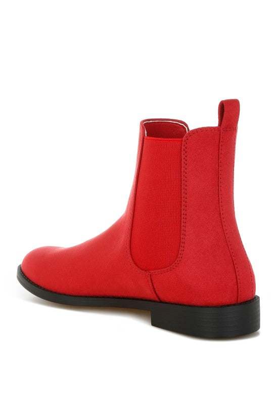 Red Ayasa Chelsea boots side view with pull tab and black sole trim