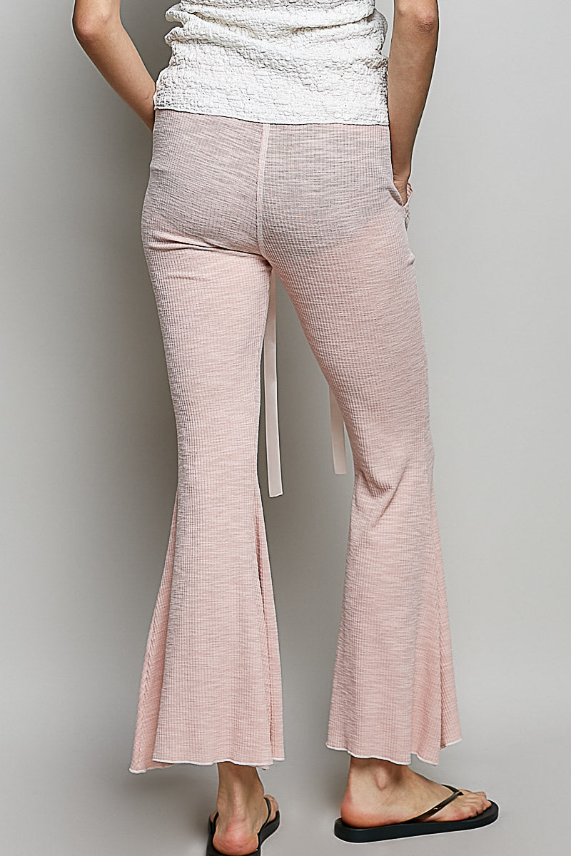 Blush pink drawstring textured rib knit pants with flared bell-bottom legs