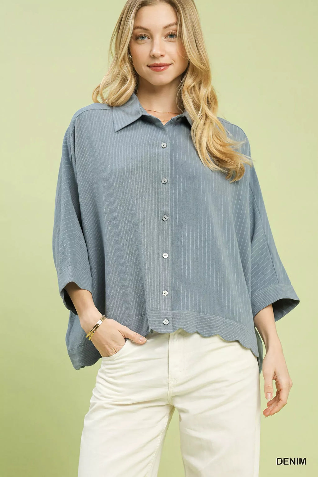 Oversized denim button-down shirt with vertical stripes and front buttons