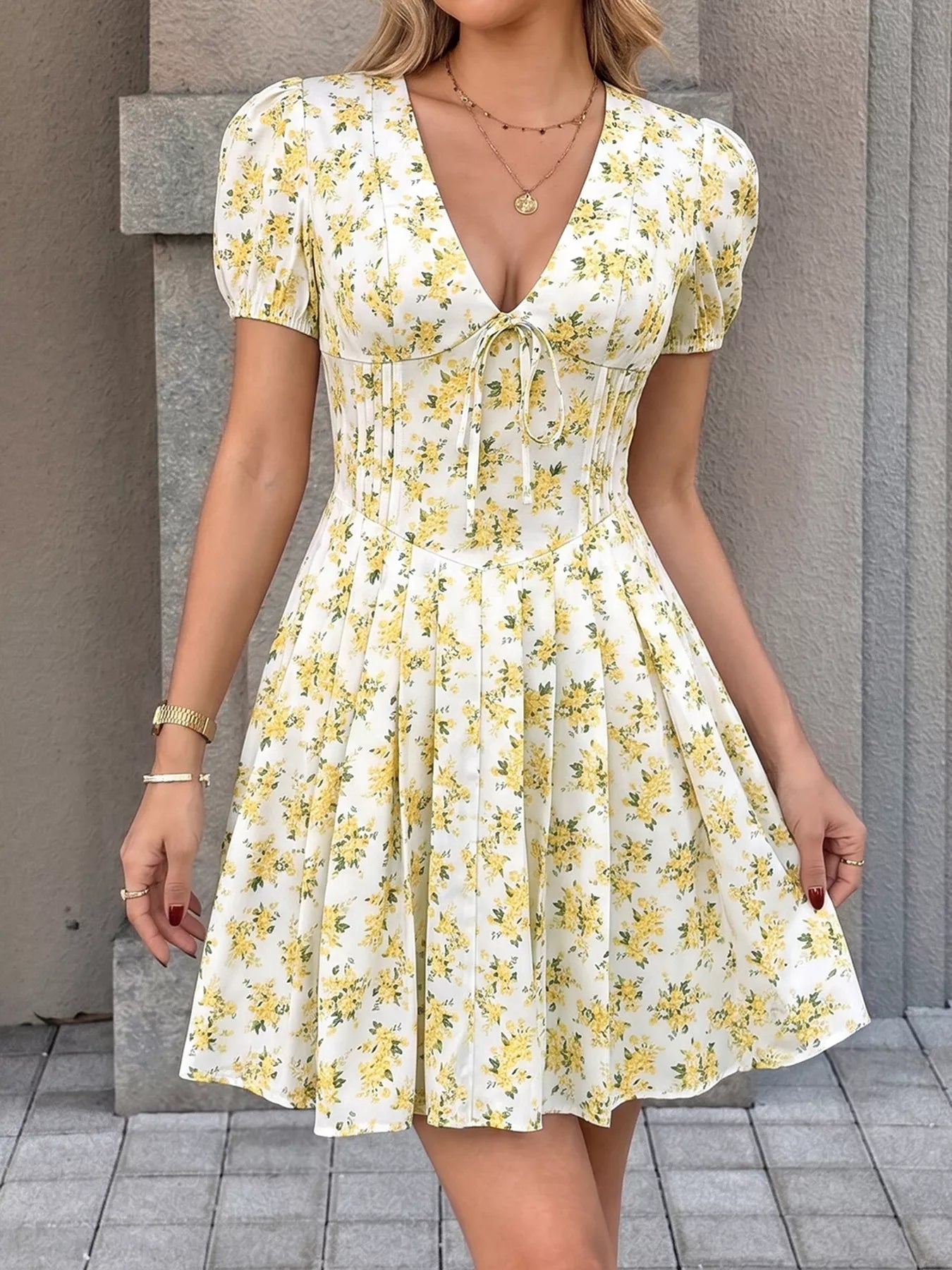 Floral print mini dress with V-neck and puff sleeves, yellow-and-green bouquet