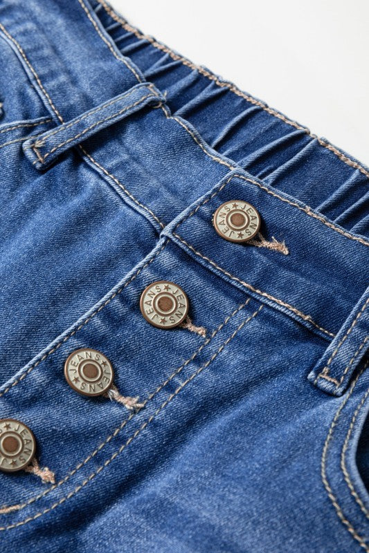 Jeans details: stitched pockets with metal buttons and bar-tack accents