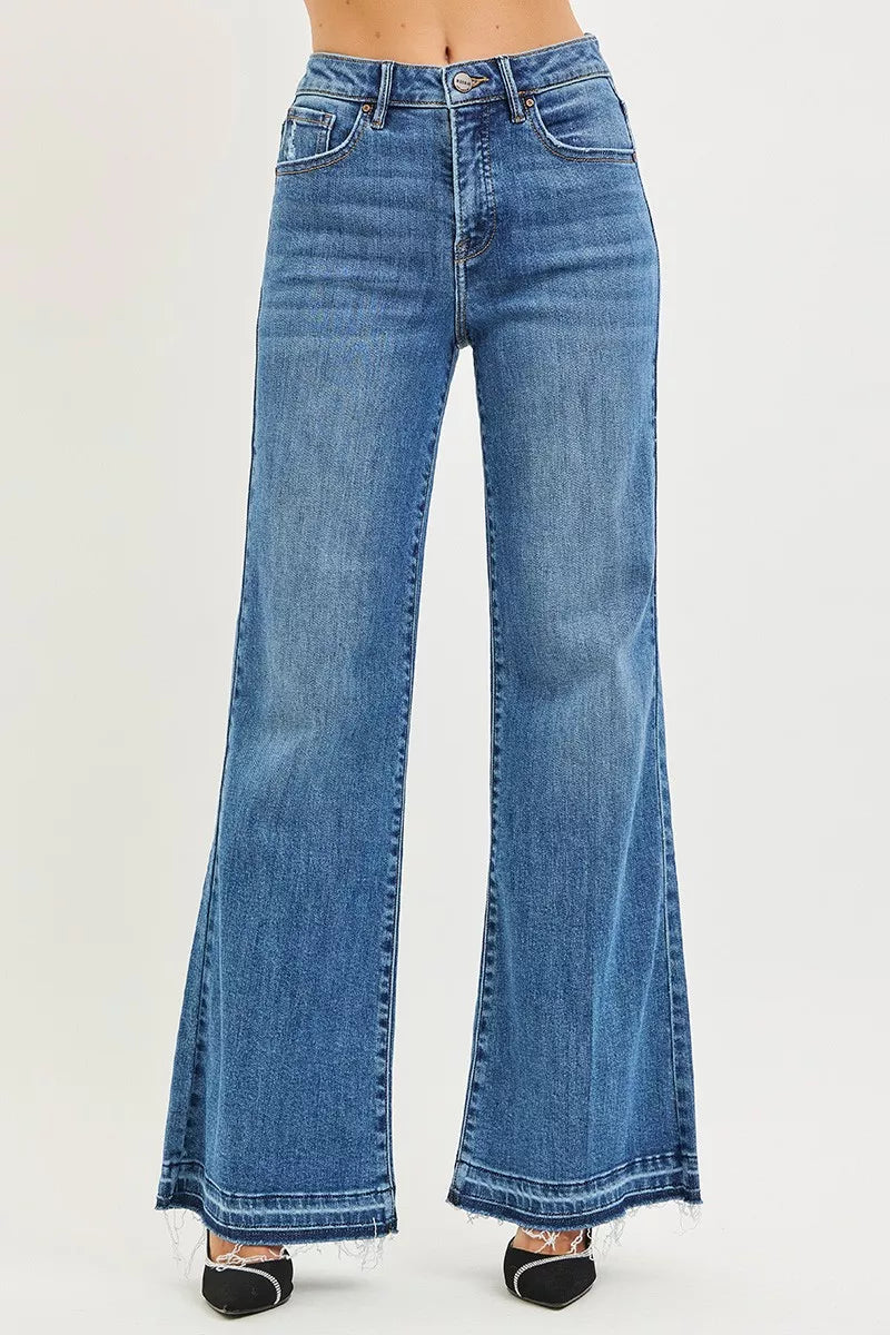 High-rise wide-leg jeans in medium blue wash with frayed released hem