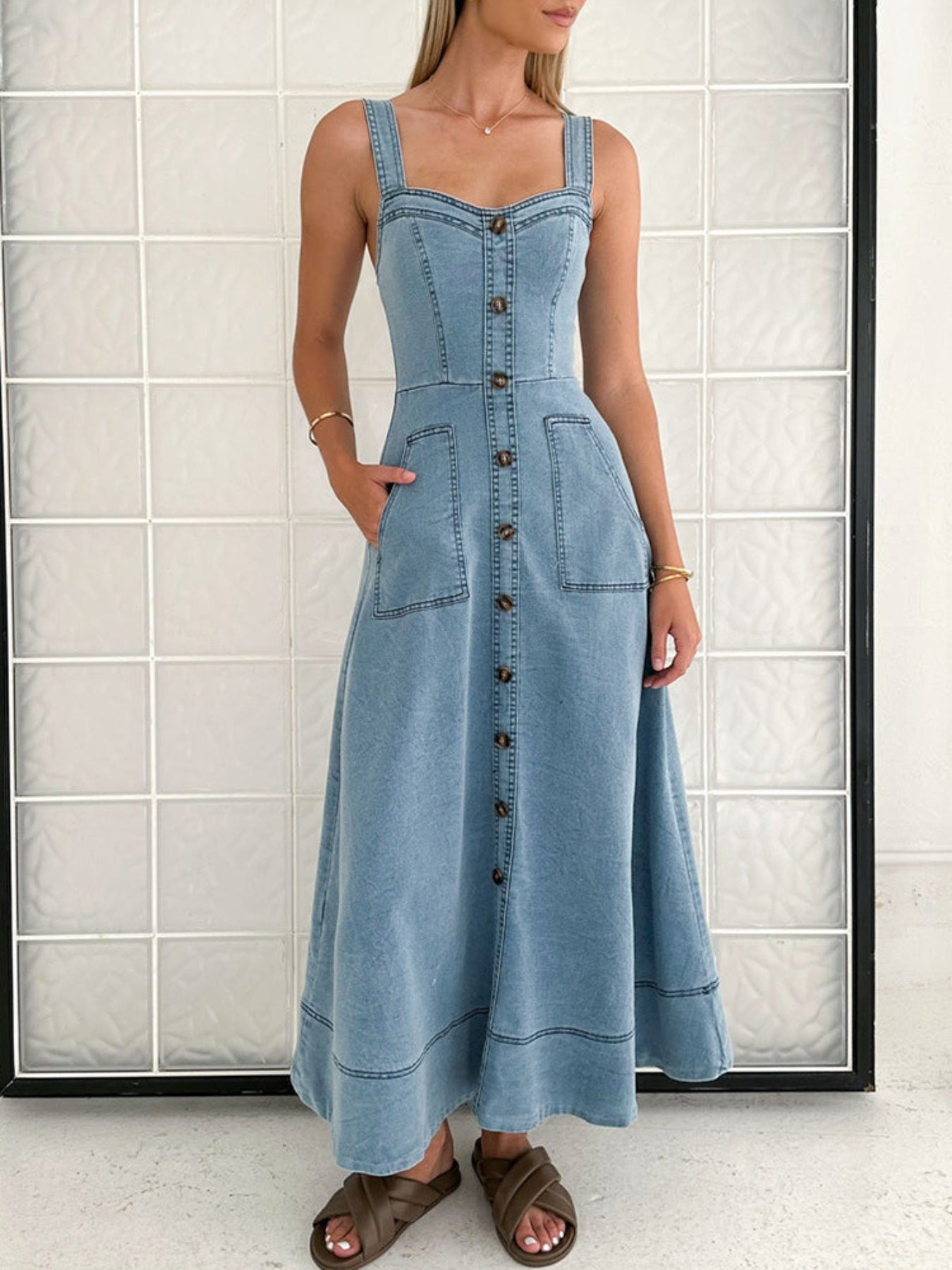 Light blue denim A-line dress with button-front placket and chest patch pockets