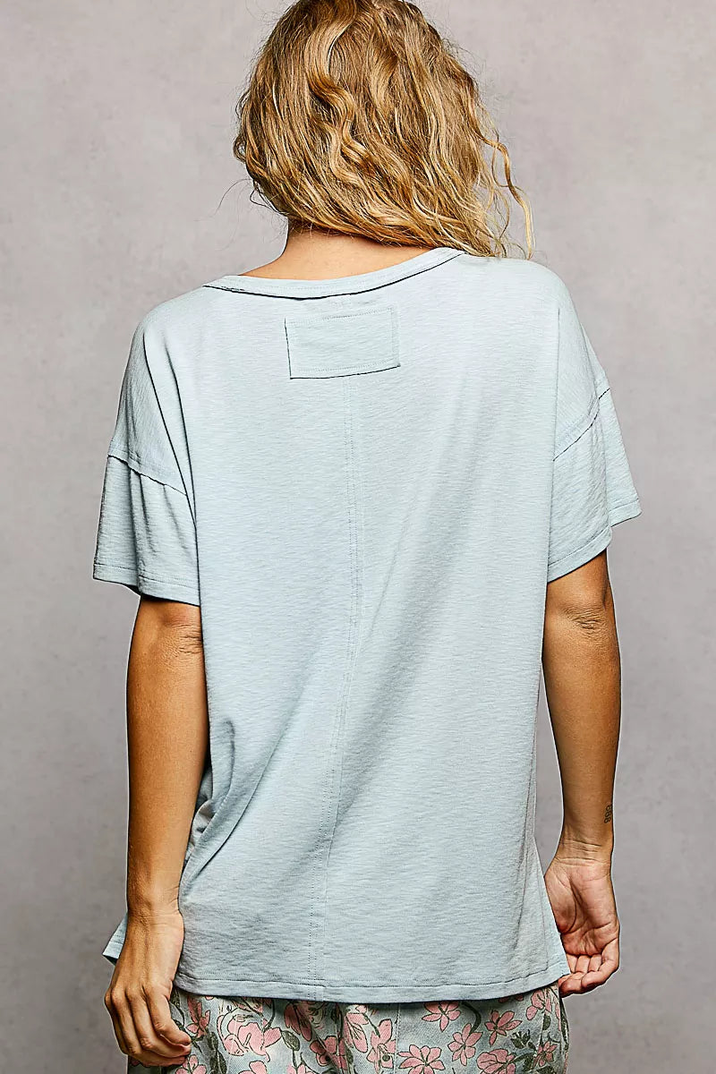 Back view: mint round-neck short sleeve tee with straight high-low hem