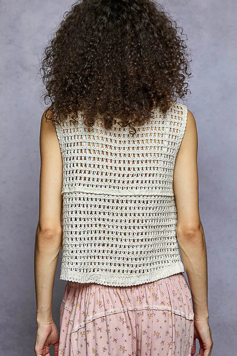 Back view: natural textured sleeveless vest with open V-back stitching