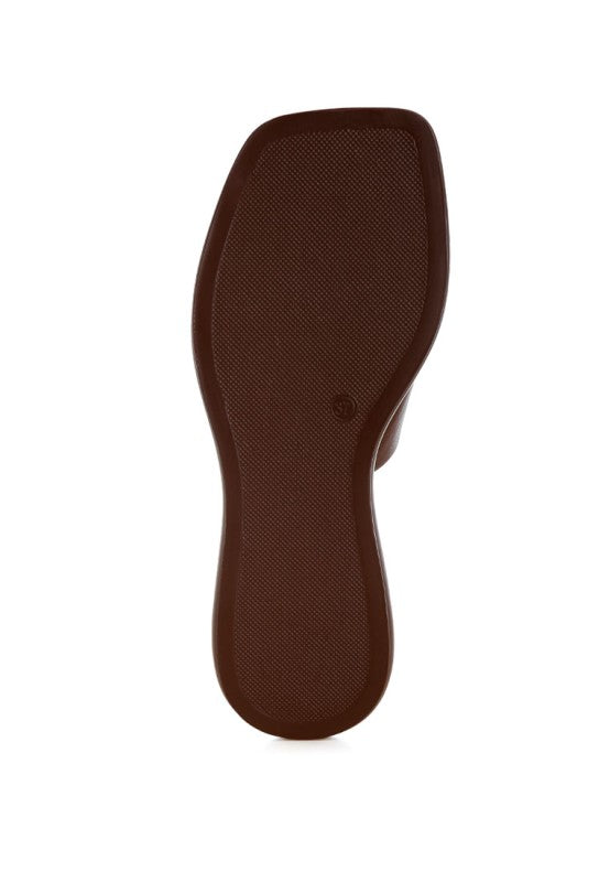 Brown flat slide sandal with square toe, inner footbed