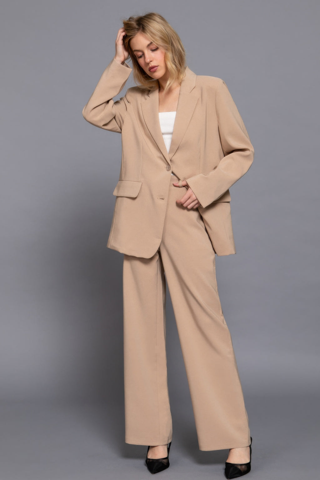 Tan straight long pants with side pockets and wide leg fit