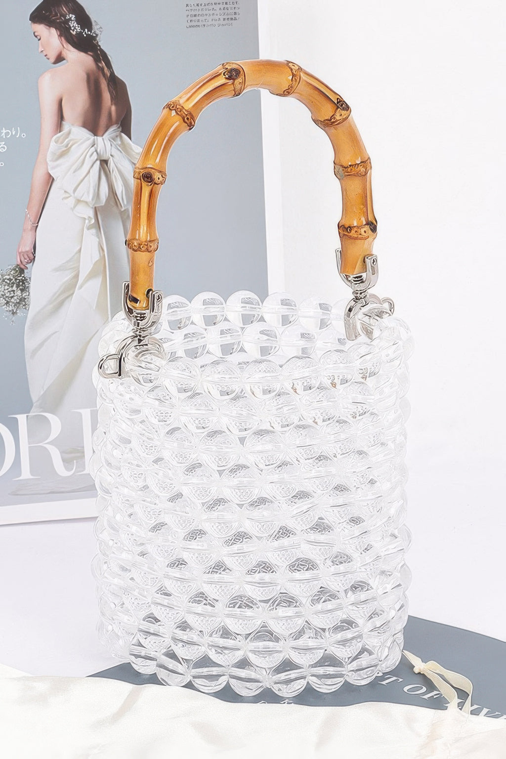 Clear transparent bead tote bag with bamboo handle, metal clasp, textured rows