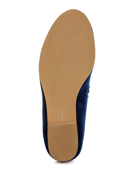 Blue velvet loafer outsole with tan bottom view