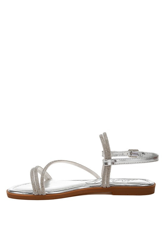 Silver rhinestone thong flat sandals with thin cross straps and flat sole