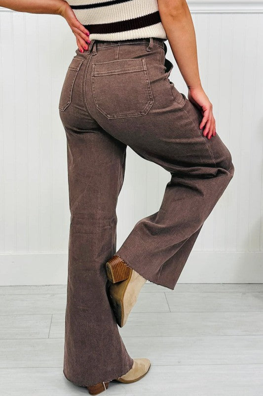 Dark brown washed loose jeans with patch pockets and wide flare leg