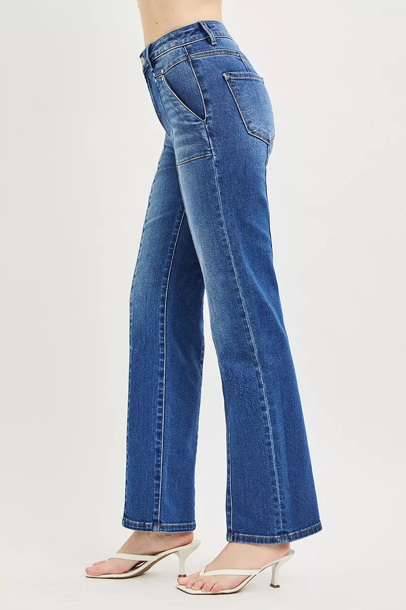 Dark high-rise straight jeans, side view with contrast stitching and back patch pocket