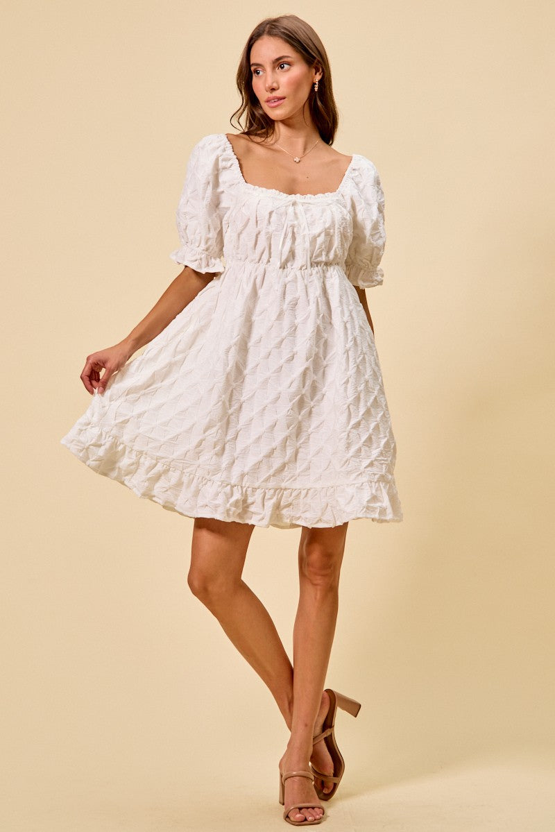 Off-white textured mini dress with ruching on bust, puff sleeves and square neckline