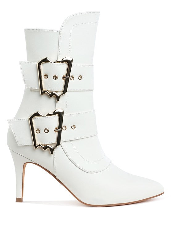 White ankle boots with double buckle straps and pointed toe, mid-height heel