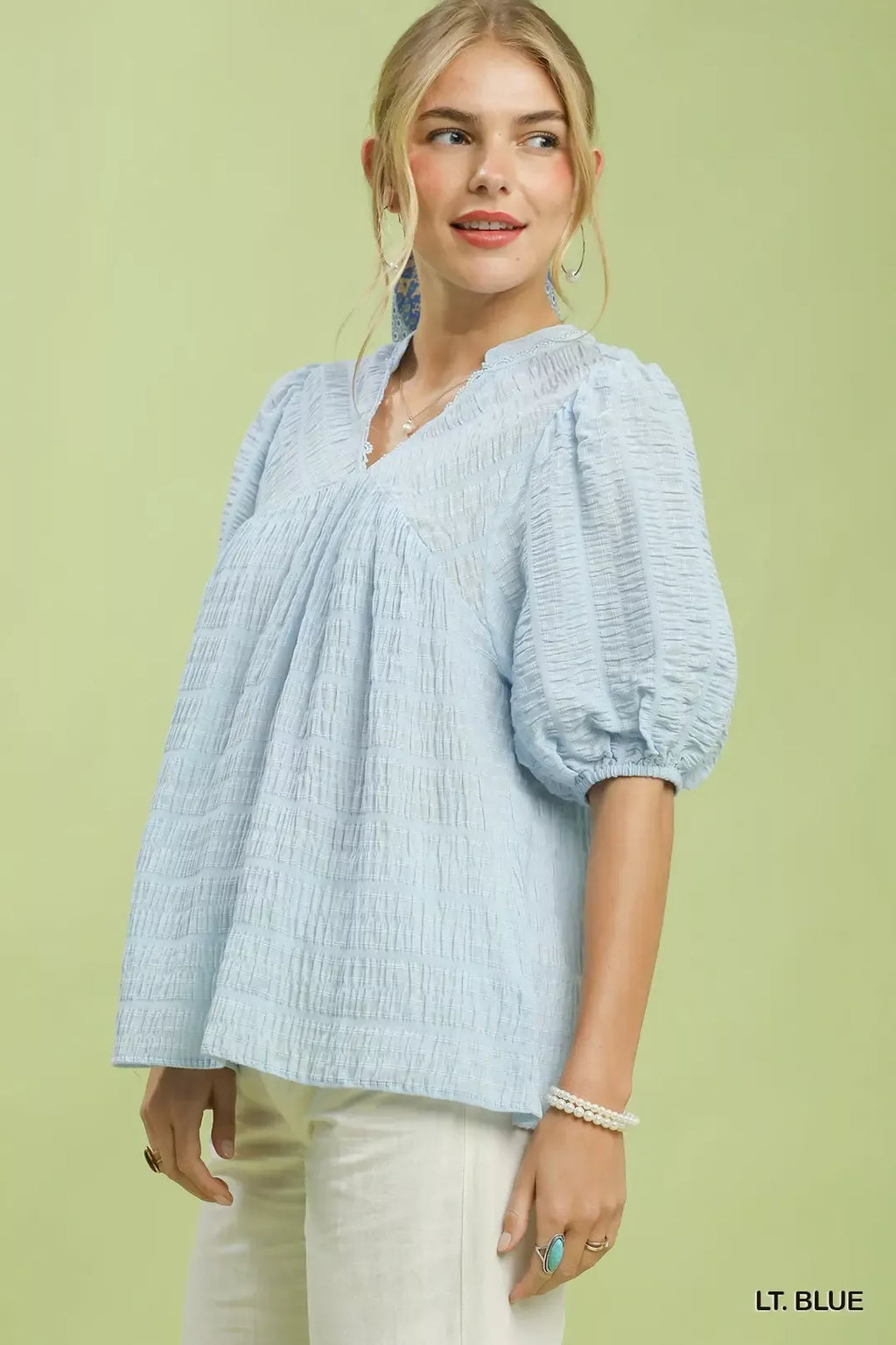 Light blue textured peasant blouse, V-neck, 3/4 puff sleeves