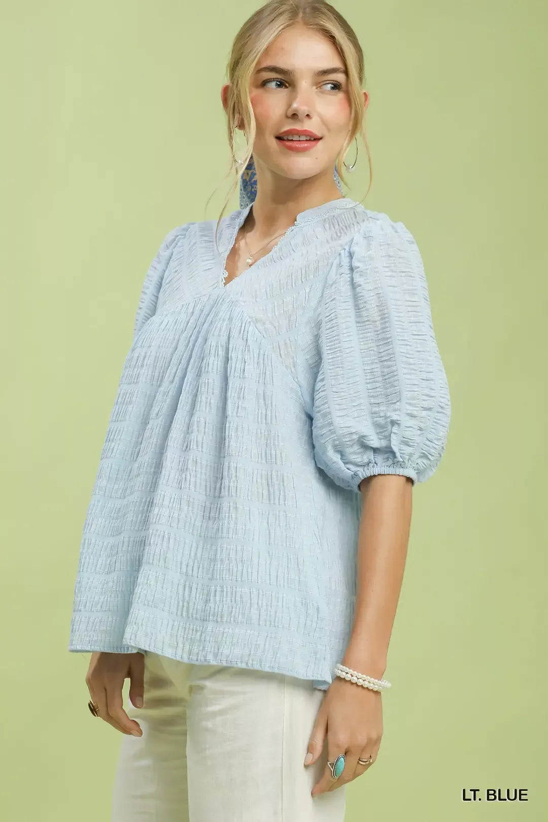 Light blue textured peasant blouse, V-neck, 3/4 puff sleeves