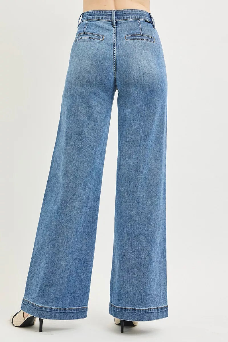 Medium wash high-rise wide-leg jeans, back patch pockets and wide flare